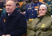 Стали известны подробности женщины, которая сидела рядом с президентом во время Парада Победы