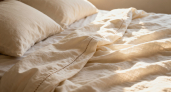 Не мнутся, не скользят, не требуют глажки: почему трикотажные простыни завоёвывают рынок постельного белья в 2026 году